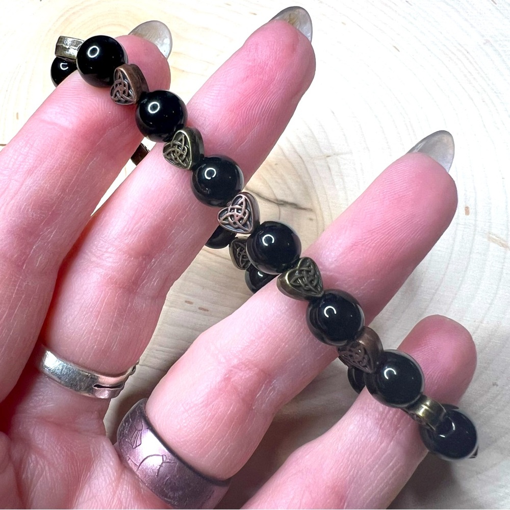 Hand crafted Obsidian, bronze and antique gold celtic hearts love bracelet 7” 💕